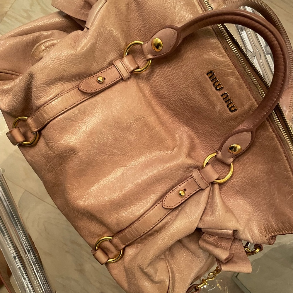 Miu miu bow bag.